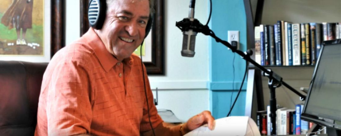 Don Connelly recording an audio podcast